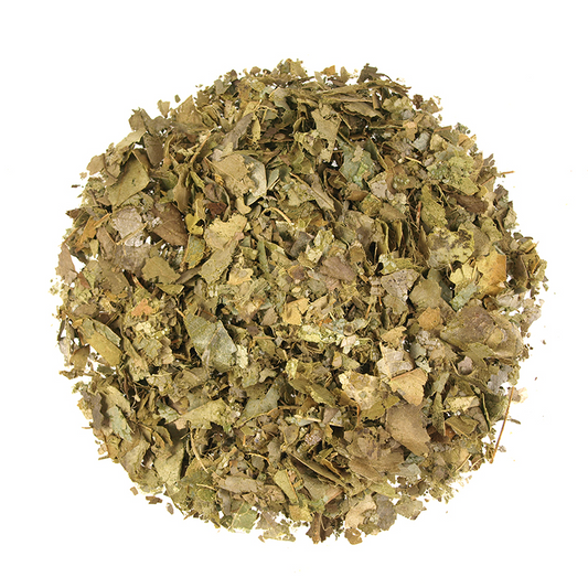 Heap of dried herbs on a white background