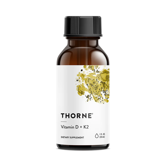 A bottle of Thorne Vitamin D3+K2 Liquid dietary supplement with a label showing a yellow and green floral design and text indicating the product name and dosage information.